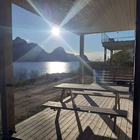 Senja, Husoy I Senja. Med Utsikt Over Fjord Og Fjell
